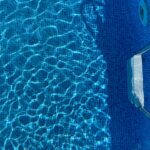 Blue and white textile on blue textile